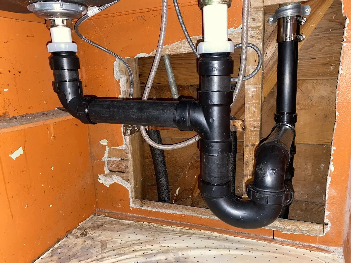 Professional Garbage Disposal Repair equipment and tools on the job in Southside